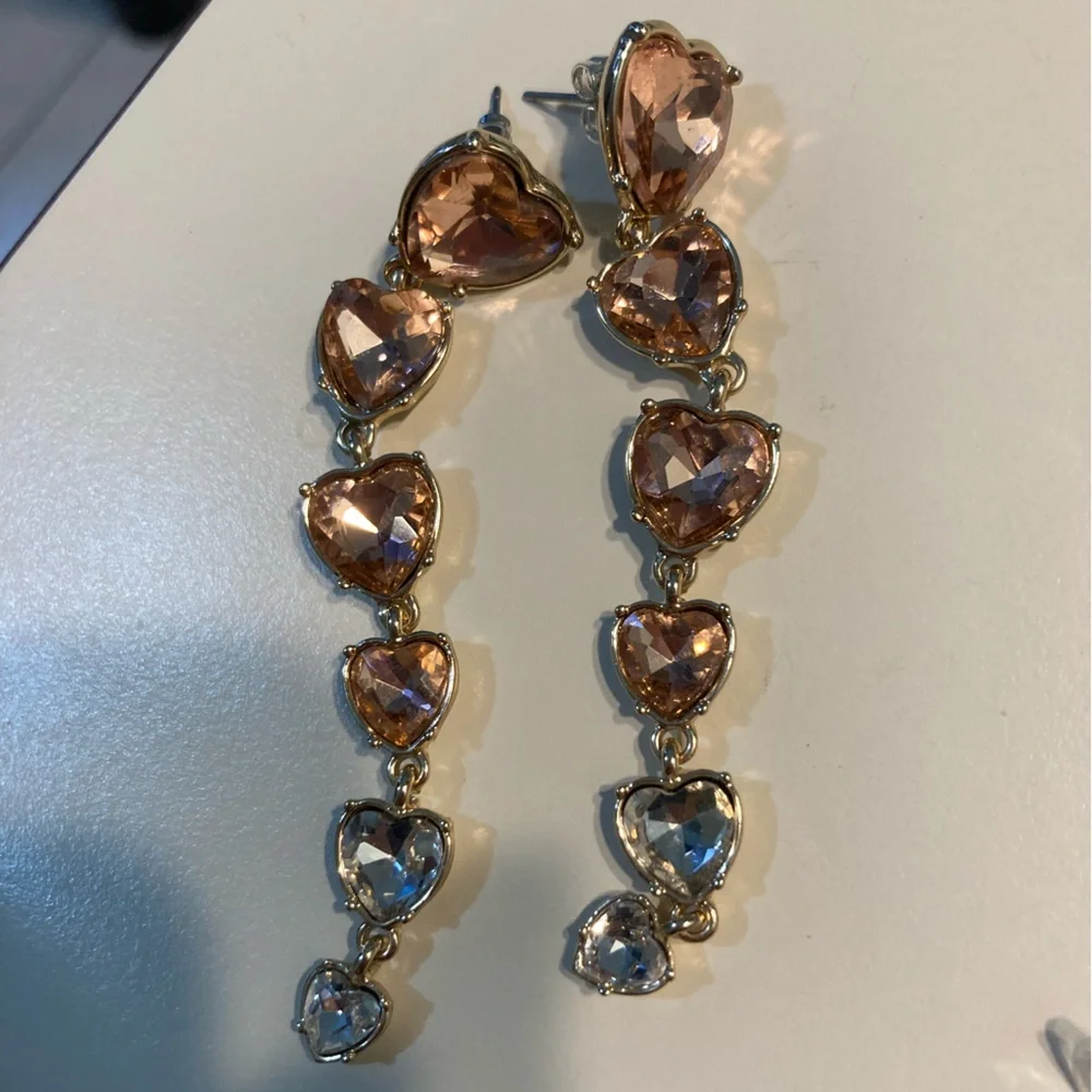 Long heart pink and diamond faux stone earrings with gold tone